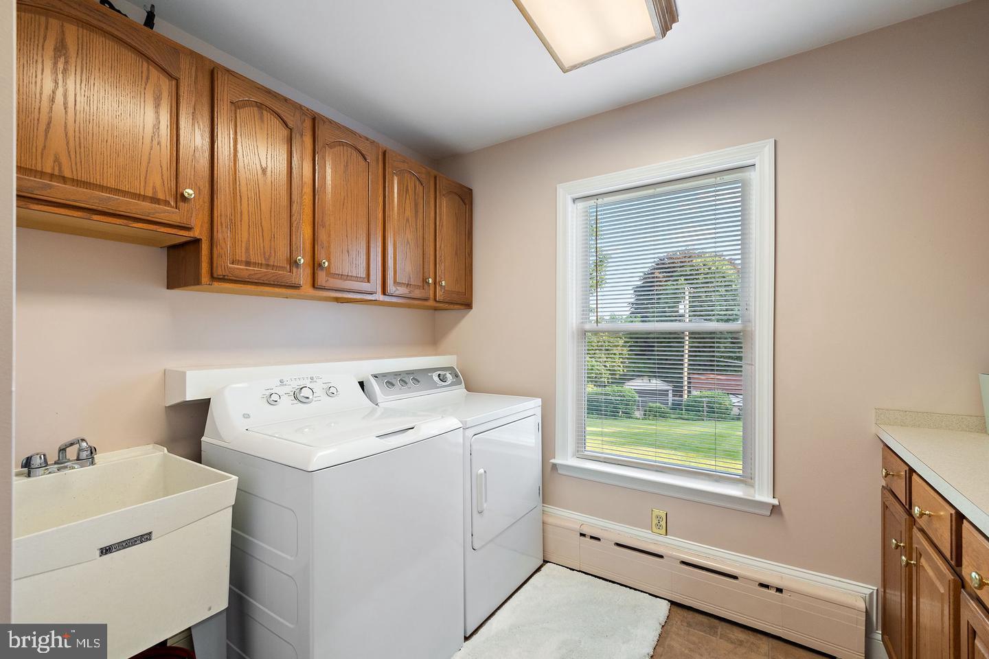 181 East Conestoga Road Wayne, PA 19087 - Photo 22 of 34 a utility room with dryer and washer