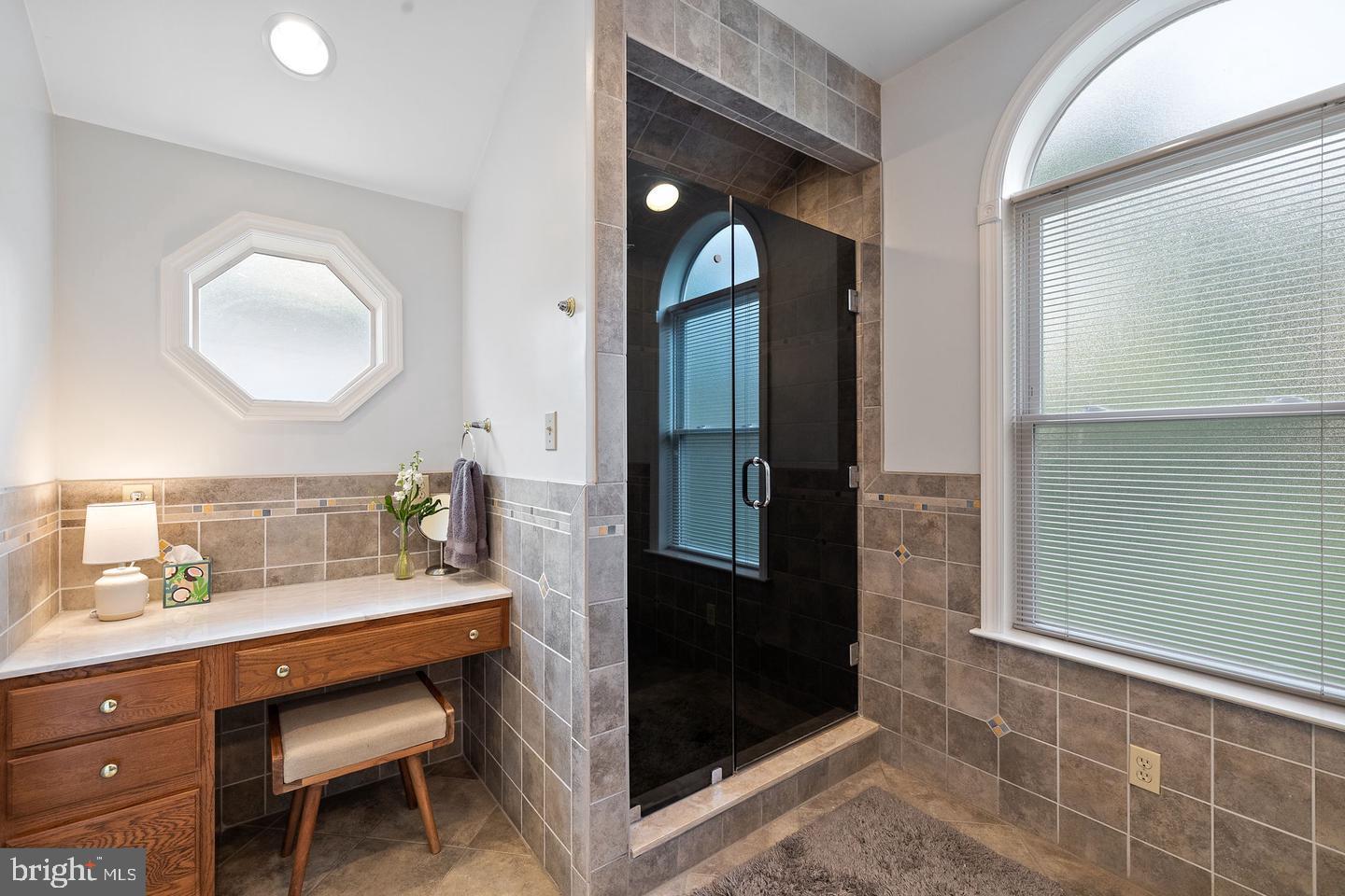 181 East Conestoga Road Wayne, PA 19087 - Photo 29 of 34 a bathroom with a sink and a mirror