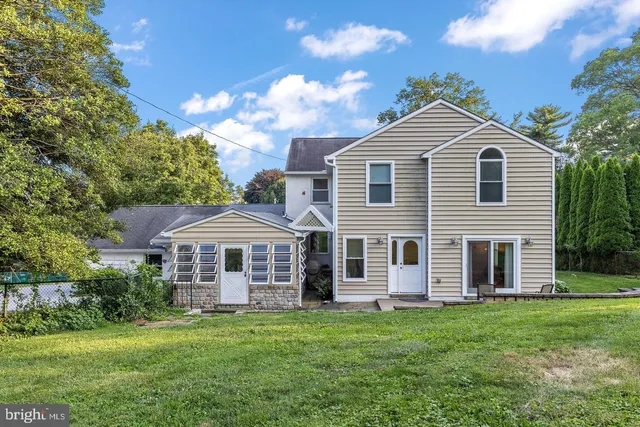 a front of a house with a yard