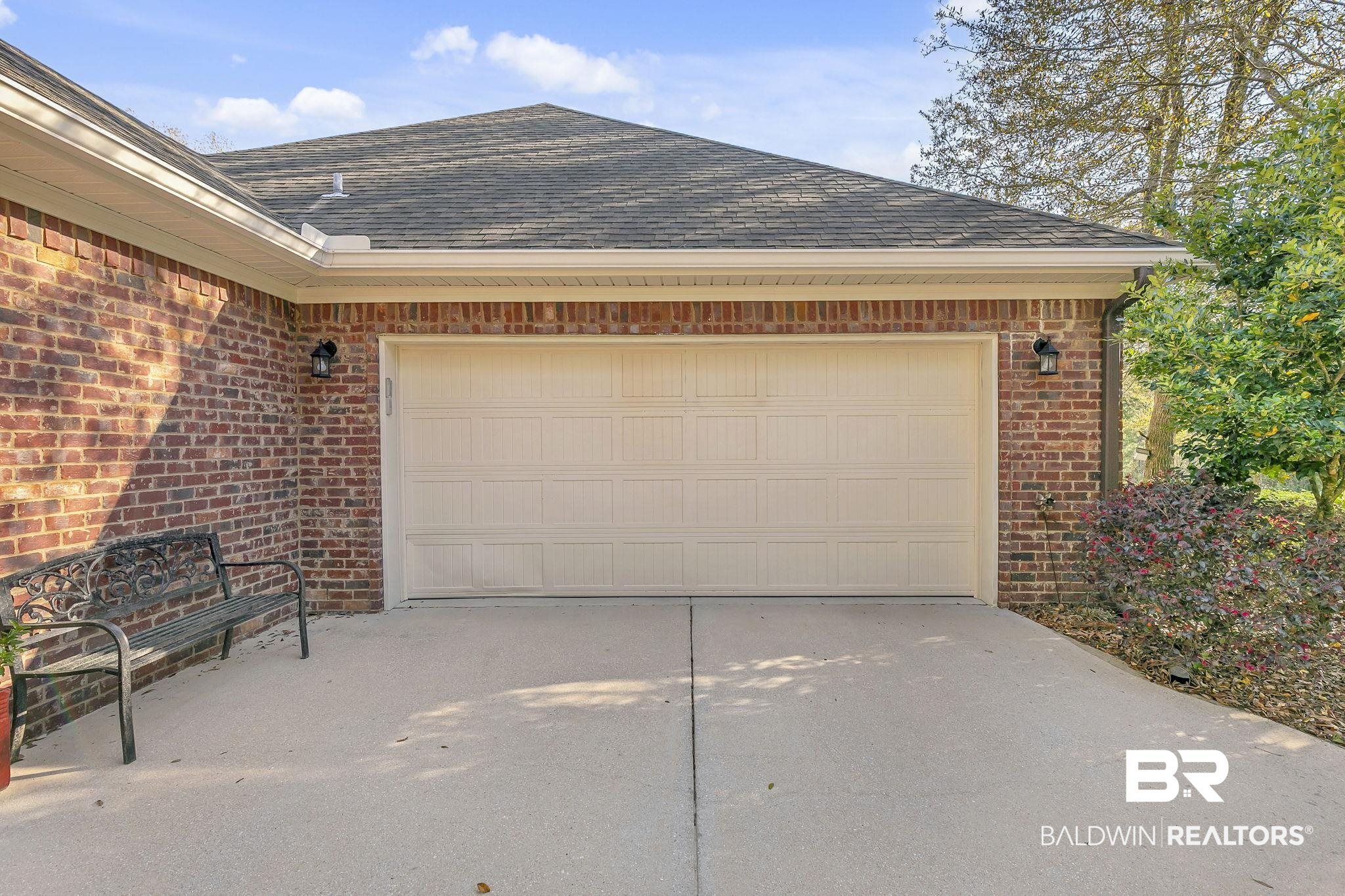 20105 Bunker Loop Fairhope, AL 36532 - Photo 49 of 65 Garage featuring concrete driveway