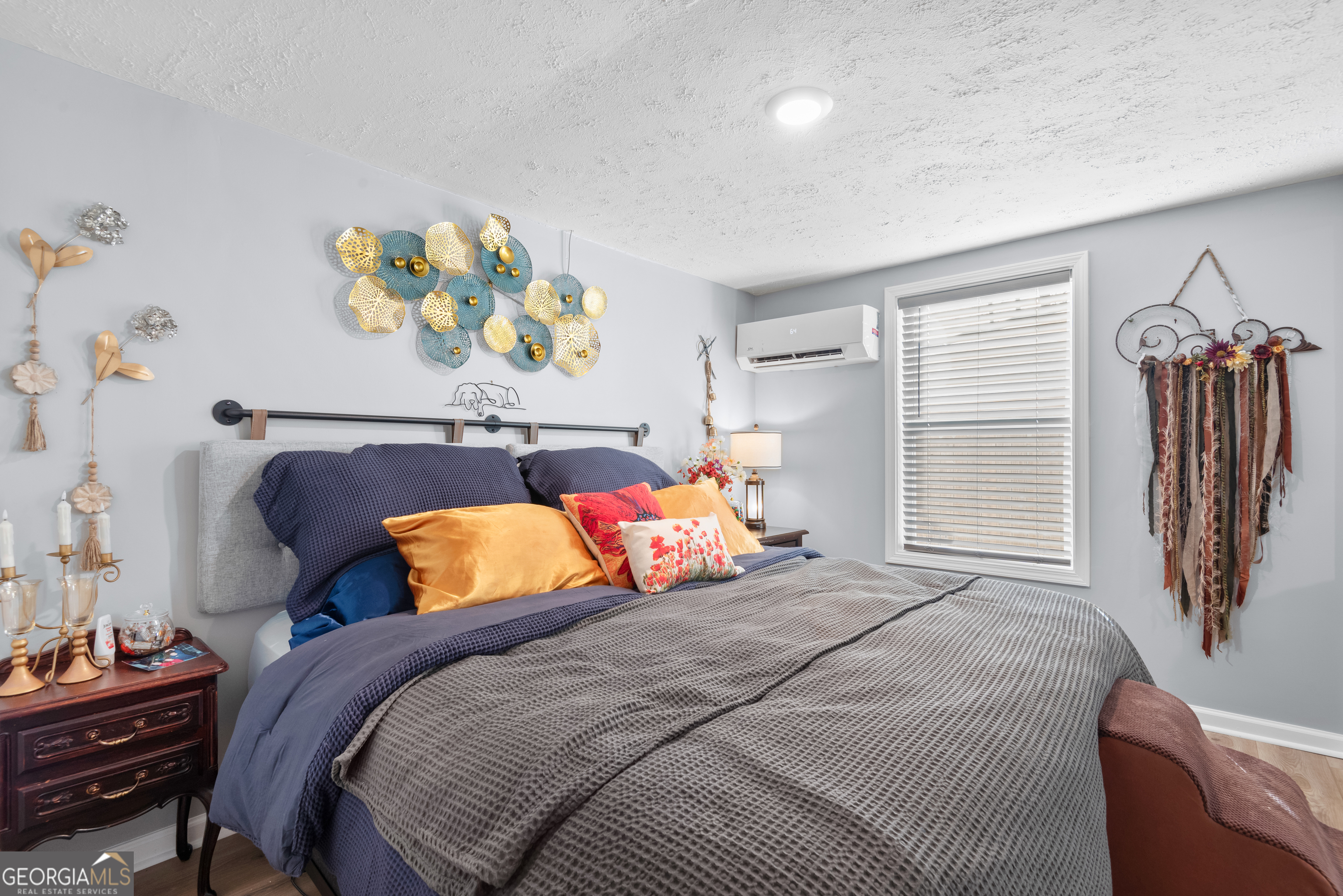 180 Southern Shores Road Jackson, GA 30233 - Photo 12 of 40 a bedroom with a bed and a window