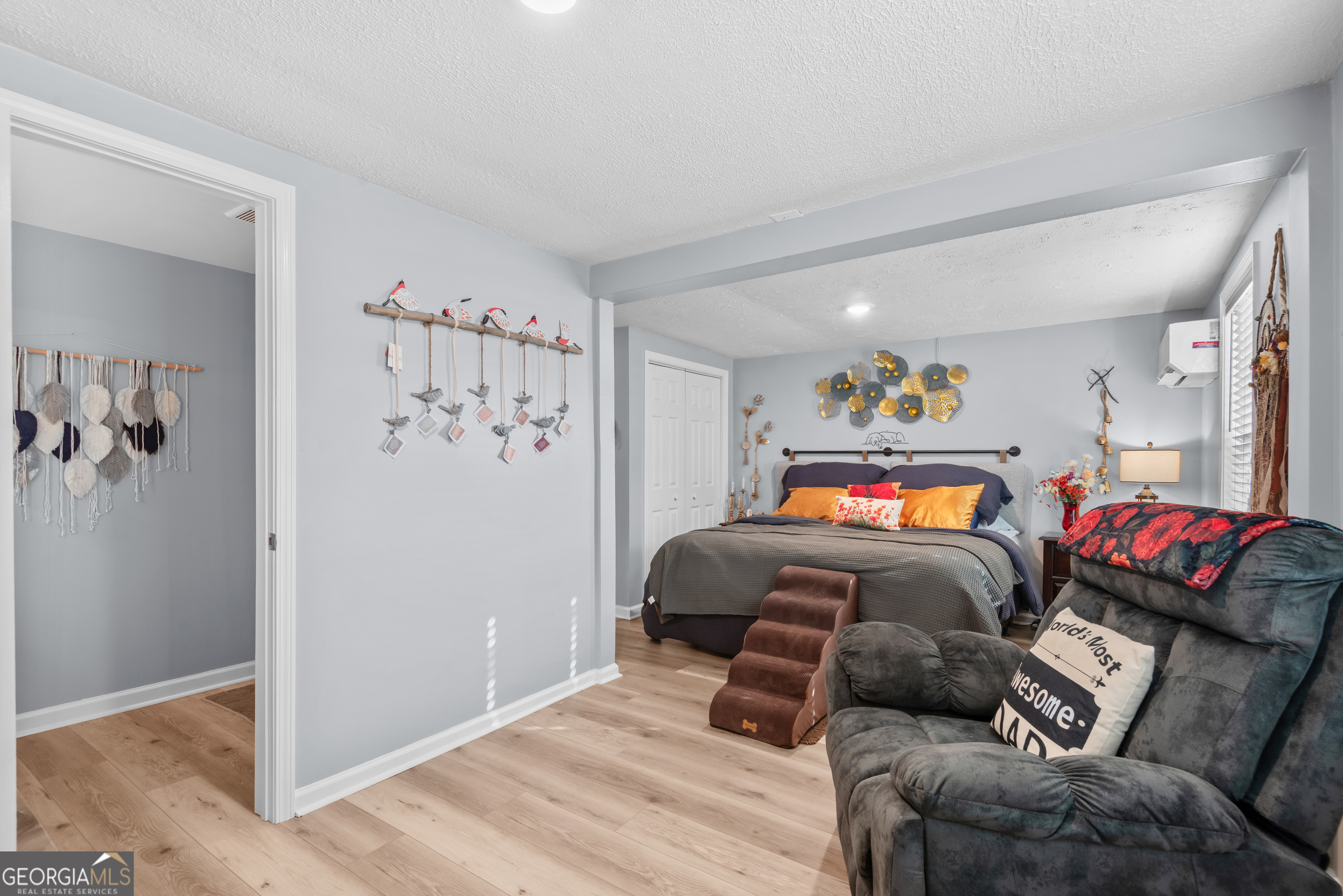 180 Southern Shores Road Jackson, GA 30233 - Photo 13 of 40 a bedroom with furniture and a couch
