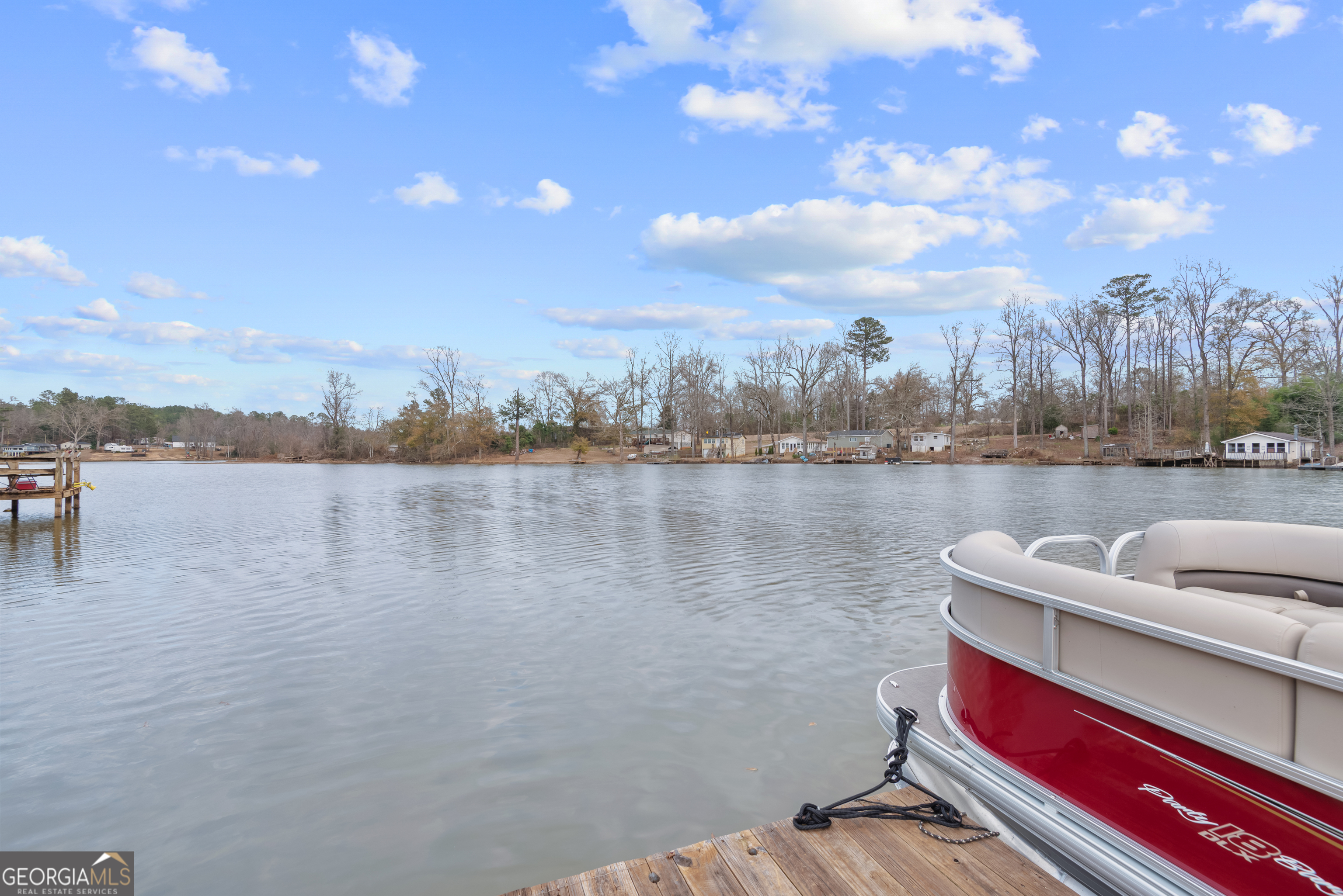 180 Southern Shores Road Jackson, GA 30233 - Photo 31 of 40 a view of outdoor space with river and trees in the background