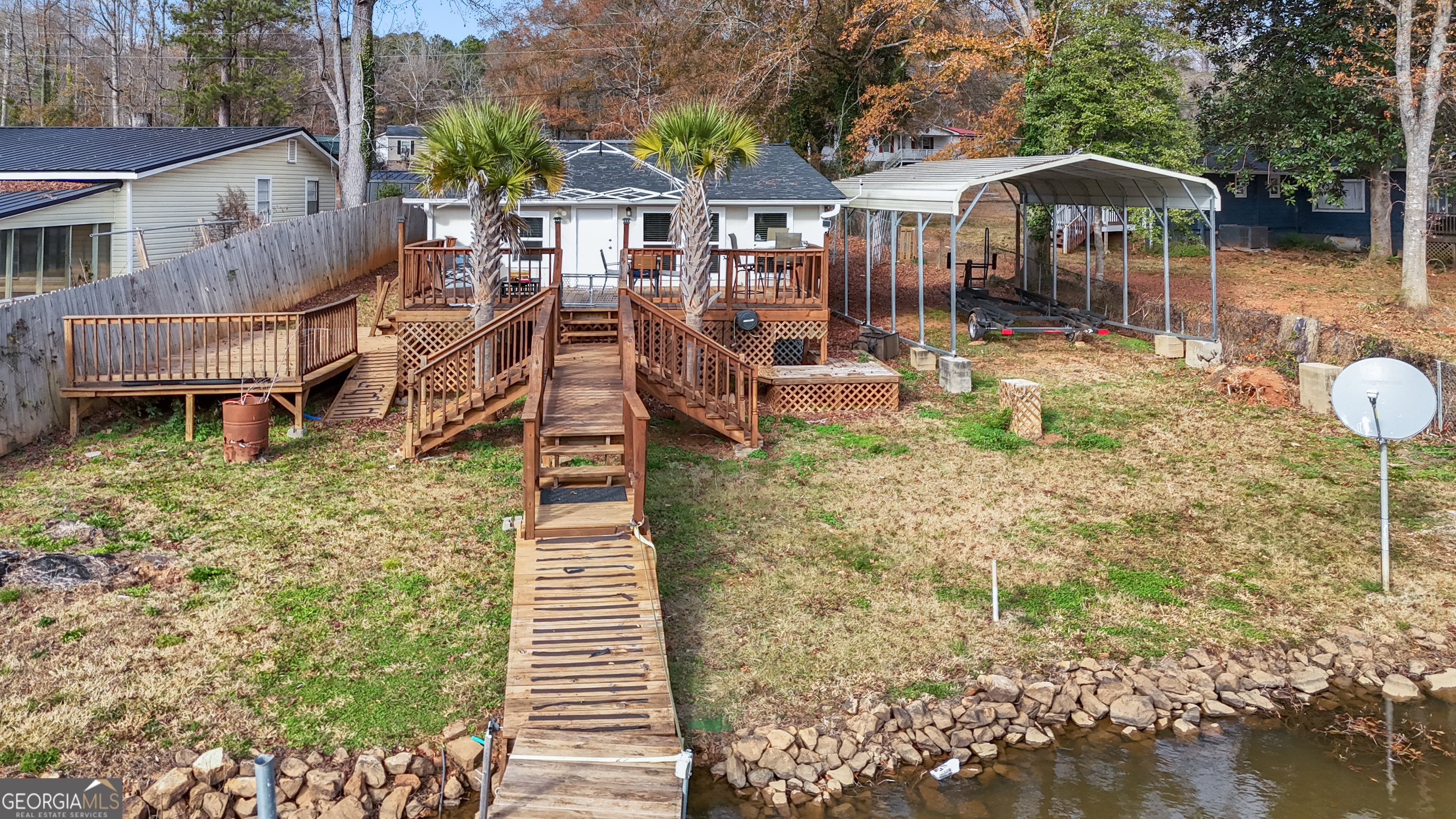 180 Southern Shores Road Jackson, GA 30233 - Photo 32 of 40 a front view of a house with a yard
