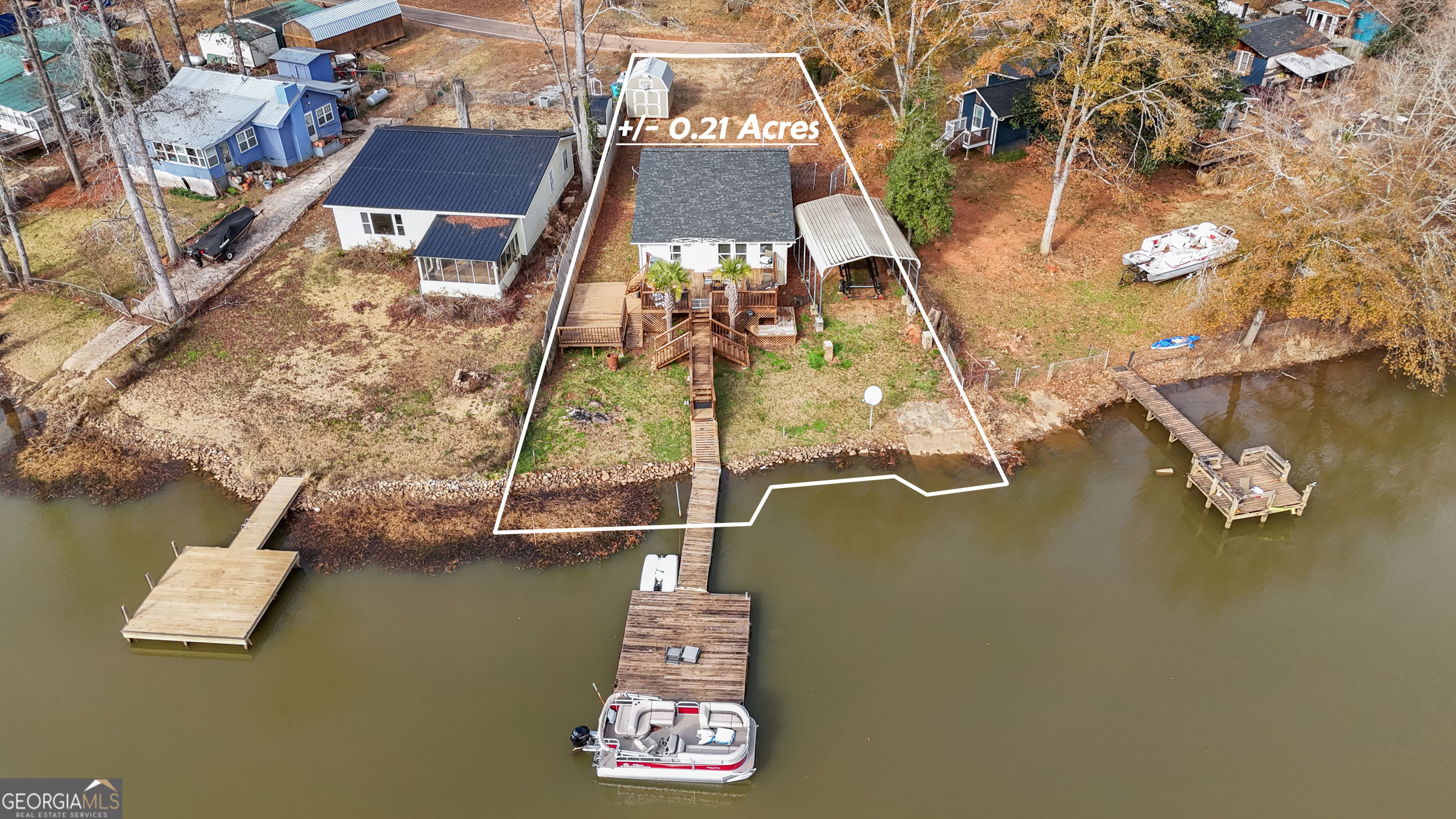 180 Southern Shores Road Jackson, GA 30233 - Photo 39 of 40 an aerial view of a house with a ocean view