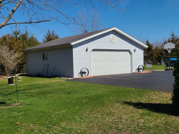 a view of a backyard of the house