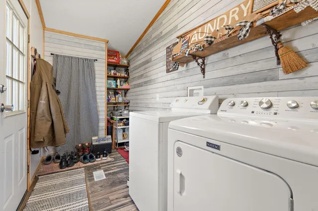 a utility room with dryer and washer