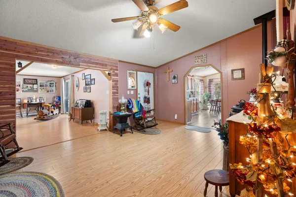 a view of a livingroom with furniture and a chandelier