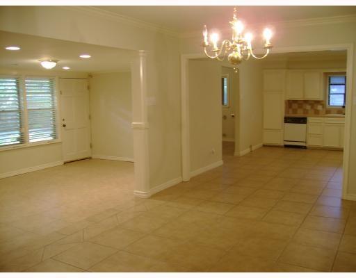 609 Peerman Place Corpus Christi, TX 78411 - Photo 4 of 10 a view of a chandelier in a room and a bathroom