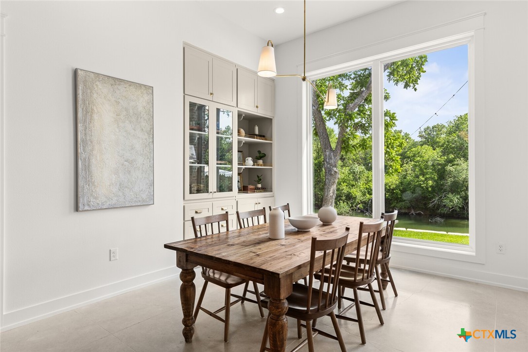 1007 Rivers Edge Drive Belton, TX 76513 - Photo 12 of 48 a view of a dining room with furniture window and outside view