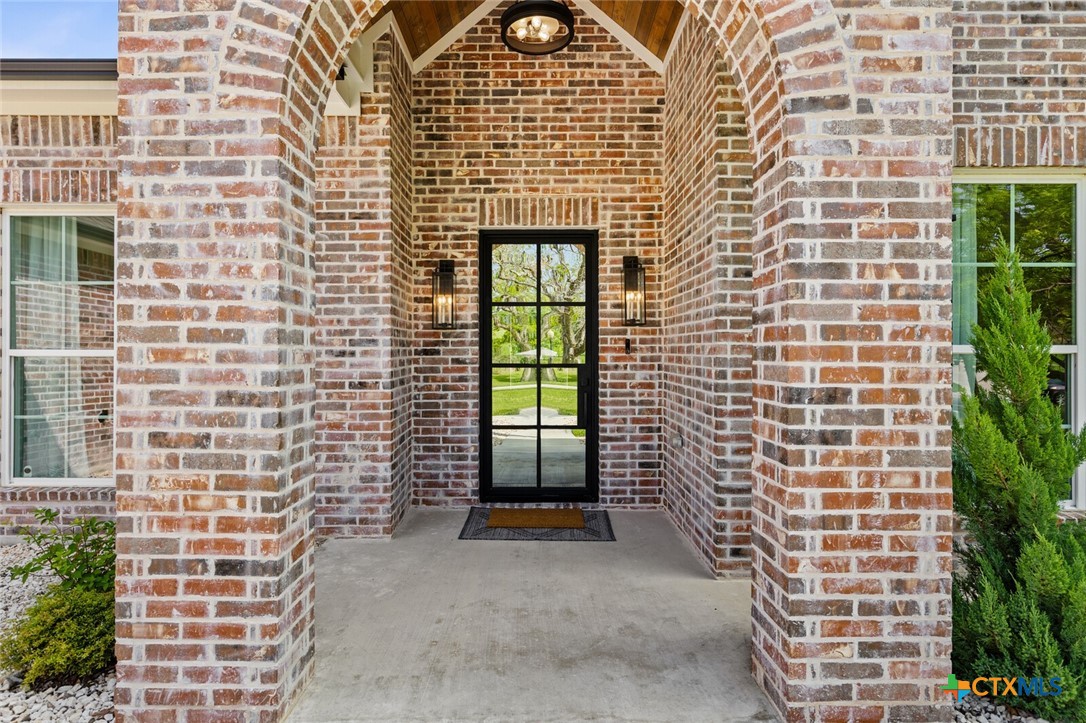 1007 Rivers Edge Drive Belton, TX 76513 - Photo 3 of 48 a view of outdoor space with brick walls