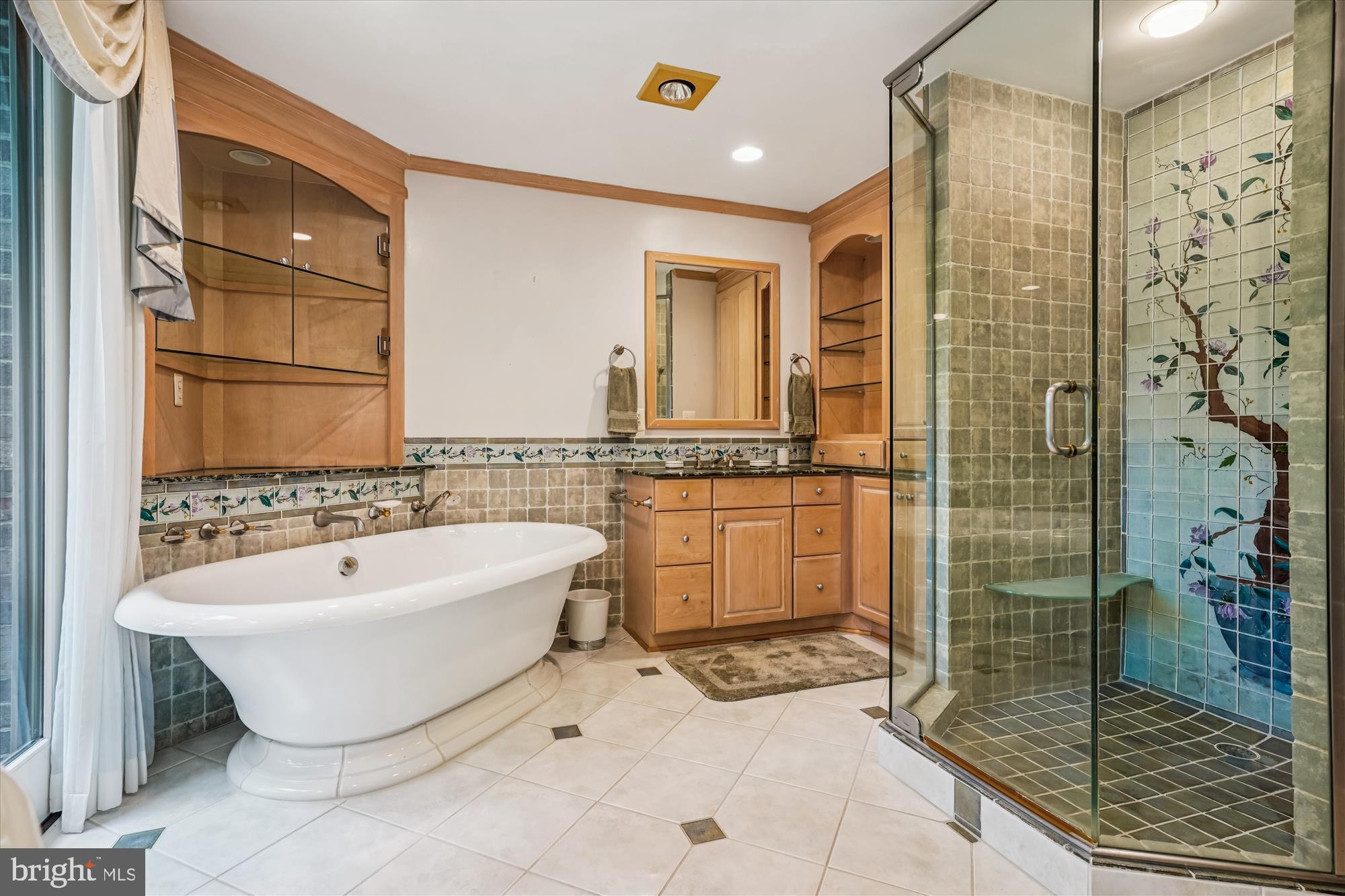 702 Belgrove Road McLean, VA 22101 - Photo 20 of 52 a bathroom with a bathtub and shower