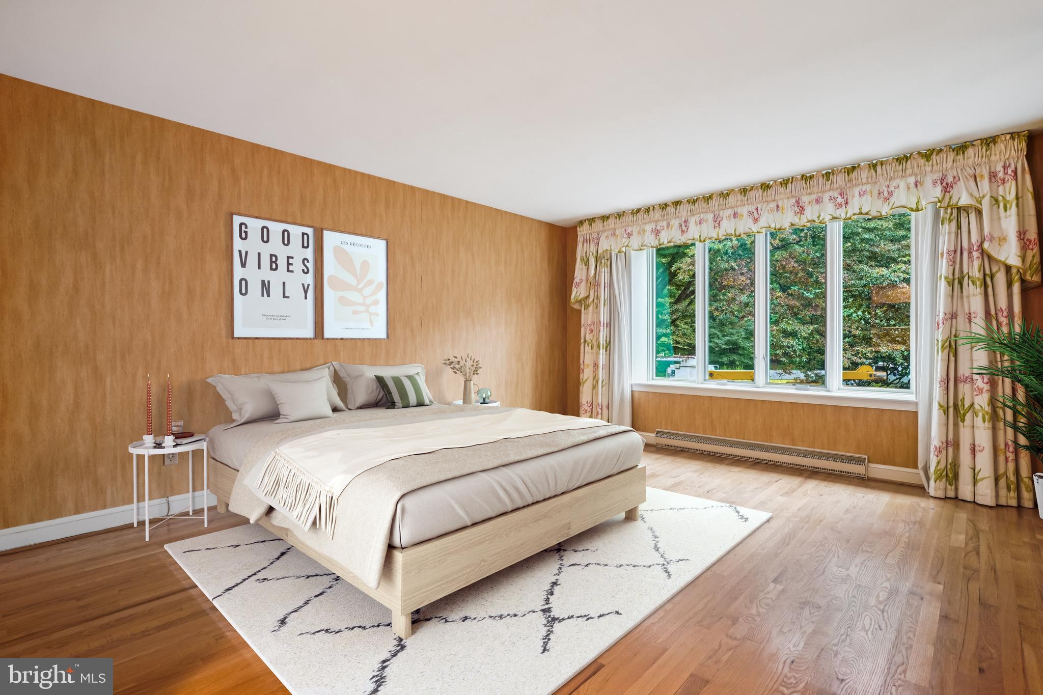 702 Belgrove Road McLean, VA 22101 - Photo 21 of 52 a spacious bedroom with a large bed and a large window