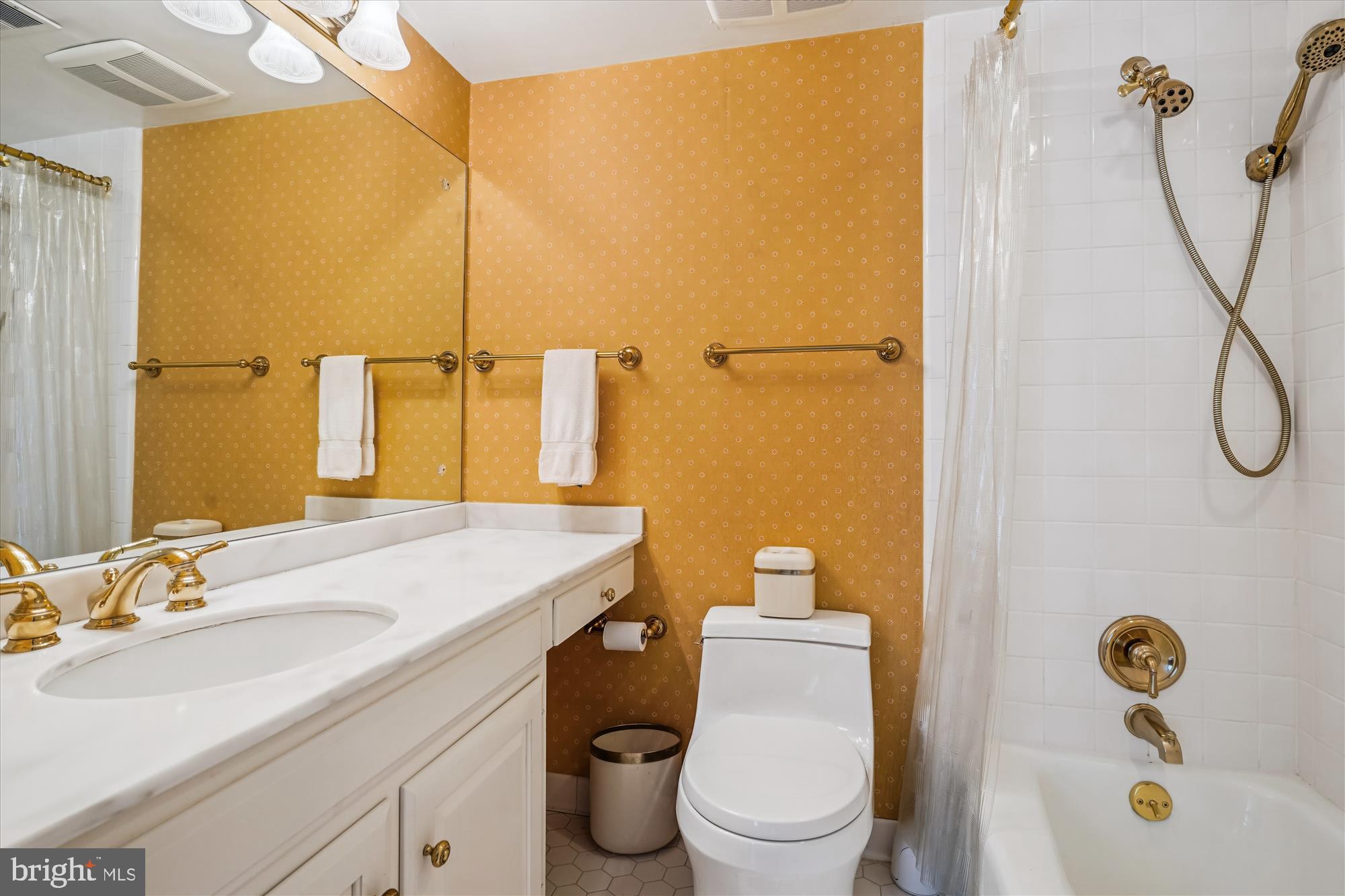 702 Belgrove Road McLean, VA 22101 - Photo 23 of 52 a bathroom with a granite countertop sink toilet and shower