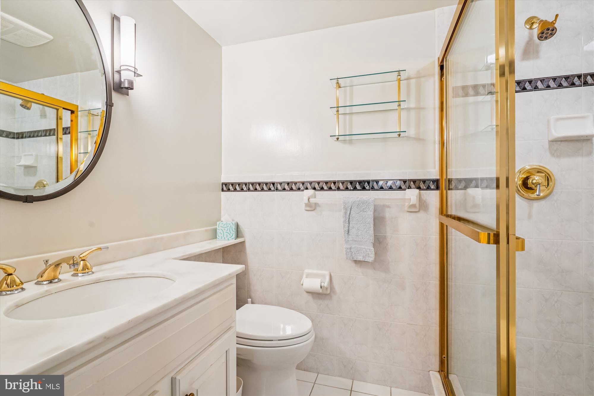 702 Belgrove Road McLean, VA 22101 - Photo 26 of 52 a bathroom with a sink toilet and shower