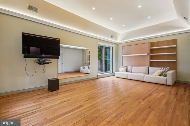 a living room with furniture and window