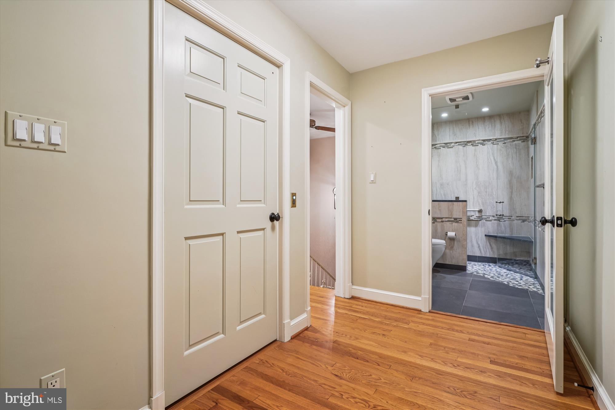 702 Belgrove Road McLean, VA 22101 - Photo 30 of 52 a view of a bathroom from a hallway