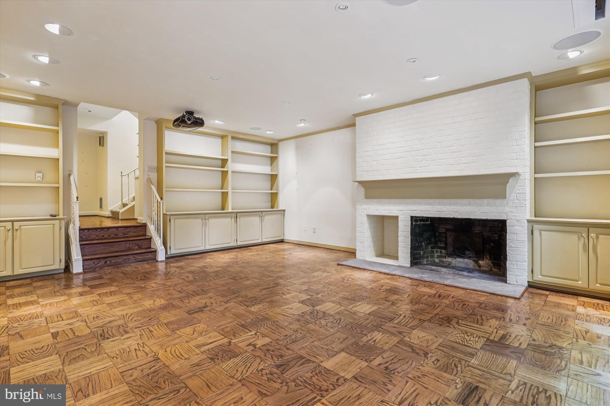 702 Belgrove Road McLean, VA 22101 - Photo 37 of 52 a view of a room with a fireplace cabinet and window