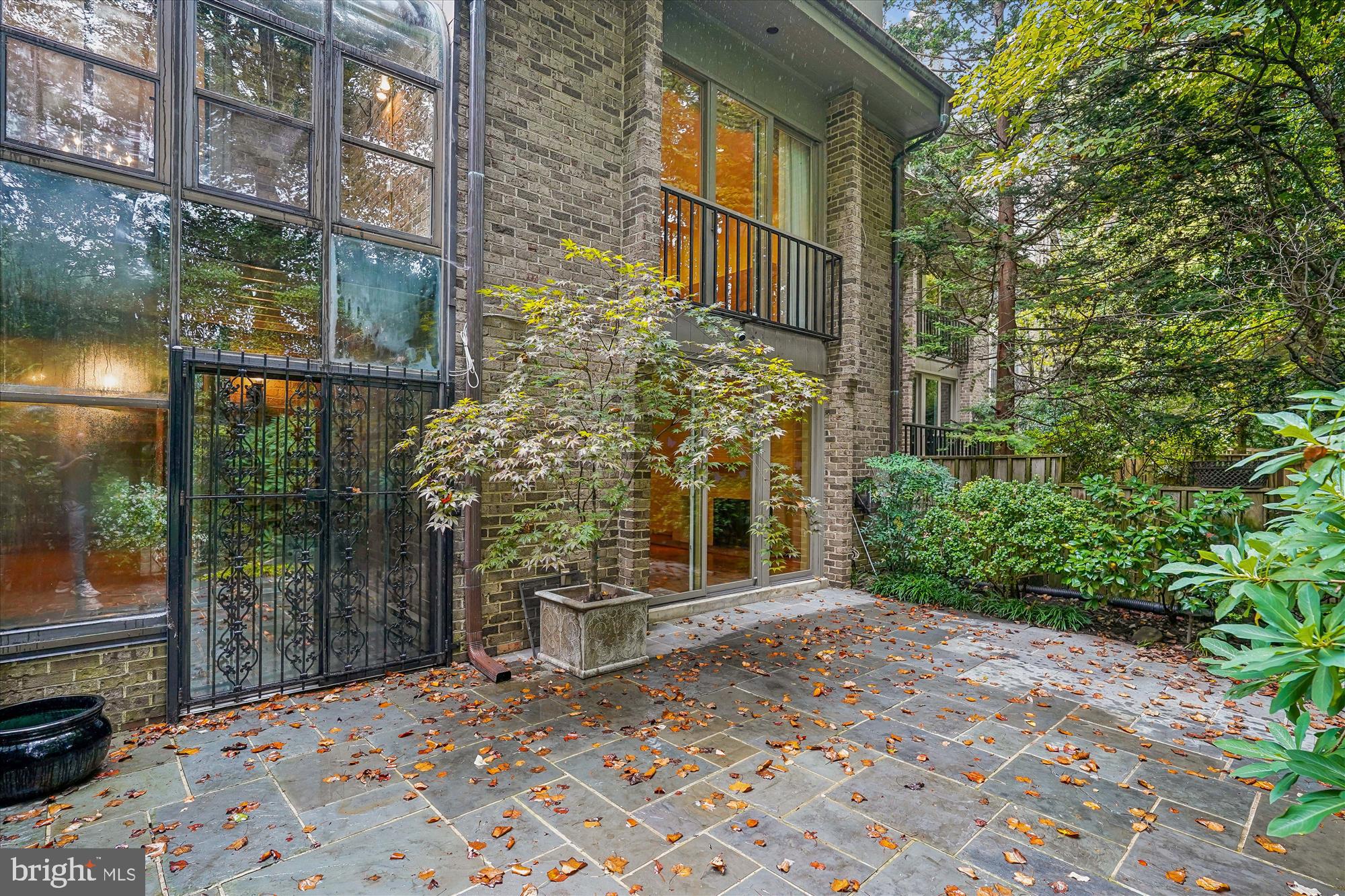 702 Belgrove Road McLean, VA 22101 - Photo 40 of 52 a view of a brick building next to a yard