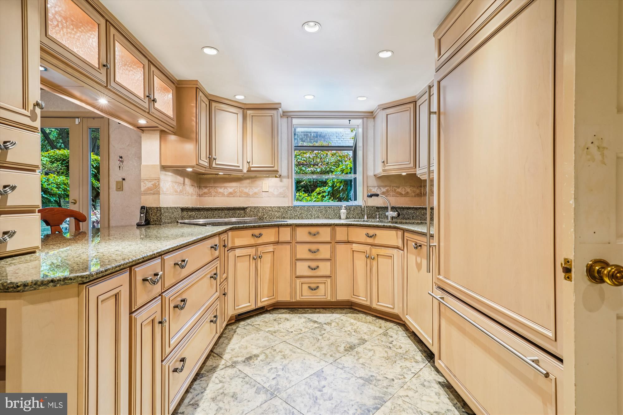 702 Belgrove Road McLean, VA 22101 - Photo 4 of 52 a large kitchen with granite countertop a sink stainless steel appliances and cabinets