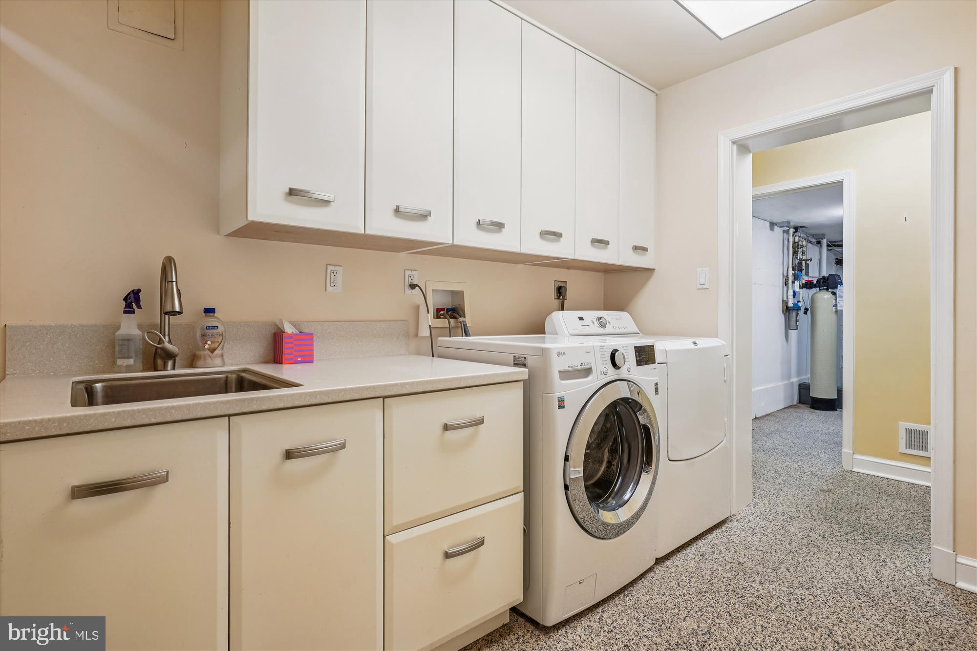 702 Belgrove Road McLean, VA 22101 - Photo 45 of 52 a utility room with sink dryer and washer
