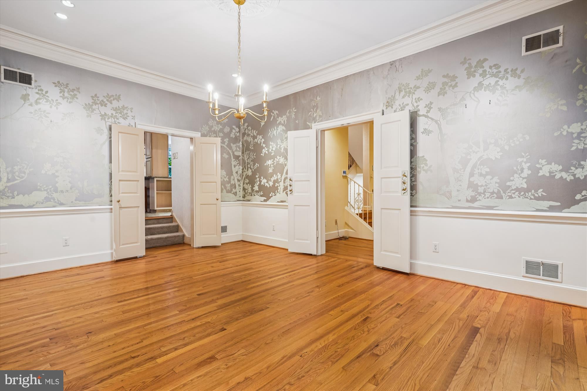 702 Belgrove Road McLean, VA 22101 - Photo 10 of 52 a view of an empty room with wooden floor and a window