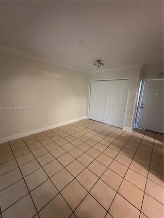 a view of a livingroom and window