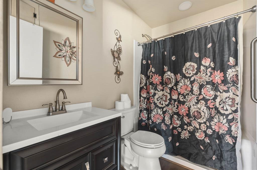 3692 Fm 66 Grandview, TX 76050 - Photo 16 of 39 a bathroom with a sink and a toilet