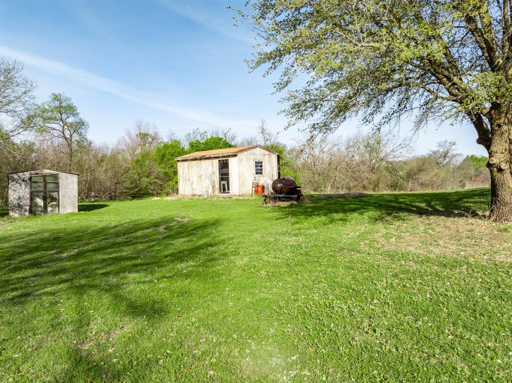 3692 Fm 66 Grandview, TX 76050 - Photo 18 of 39 a view of a house with a yard