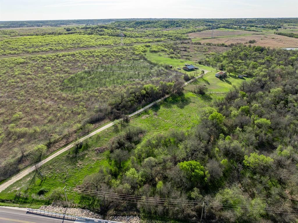 3692 Fm 66 Grandview, TX 76050 - Photo 2 of 39 a view of a green field with an ocean view
