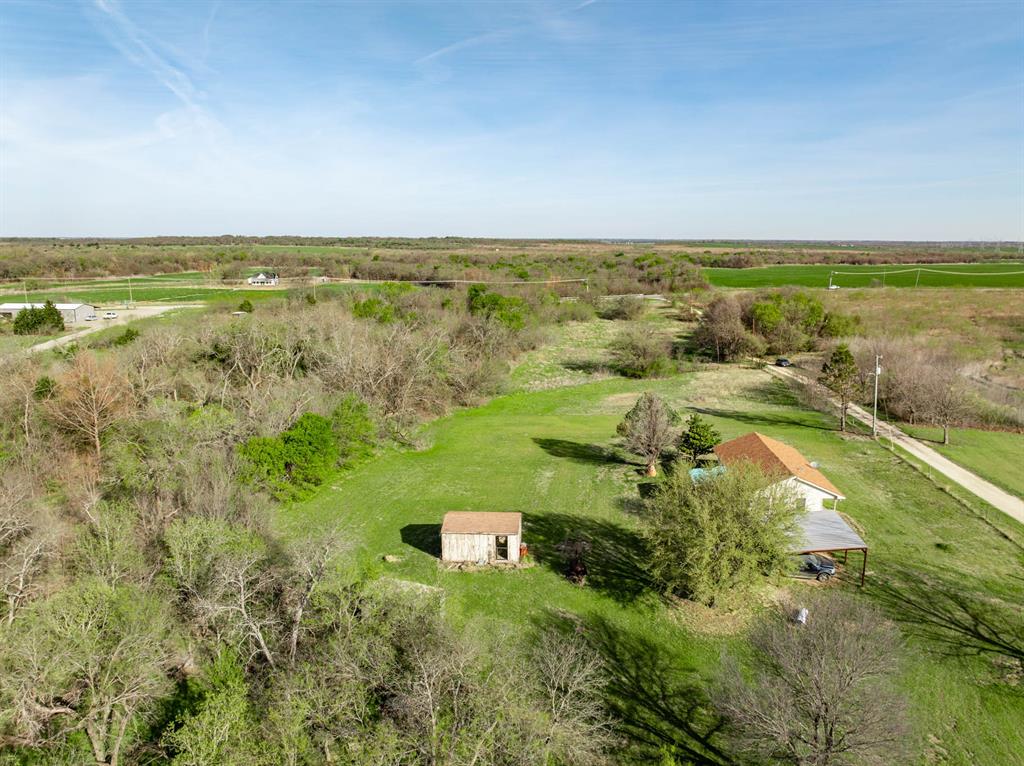 3692 Fm 66 Grandview, TX 76050 - Photo 6 of 39 a view of a city with an ocean