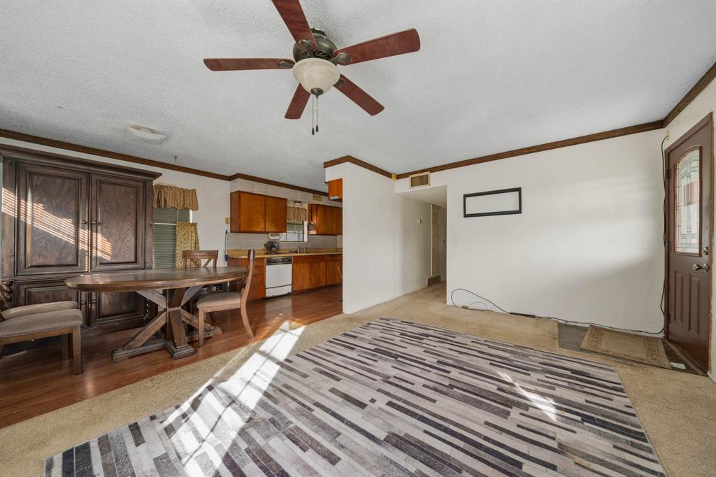 3692 Fm 66 Grandview, TX 76050 - Photo 9 of 39 a view of a livingroom with furniture and kitchen view
