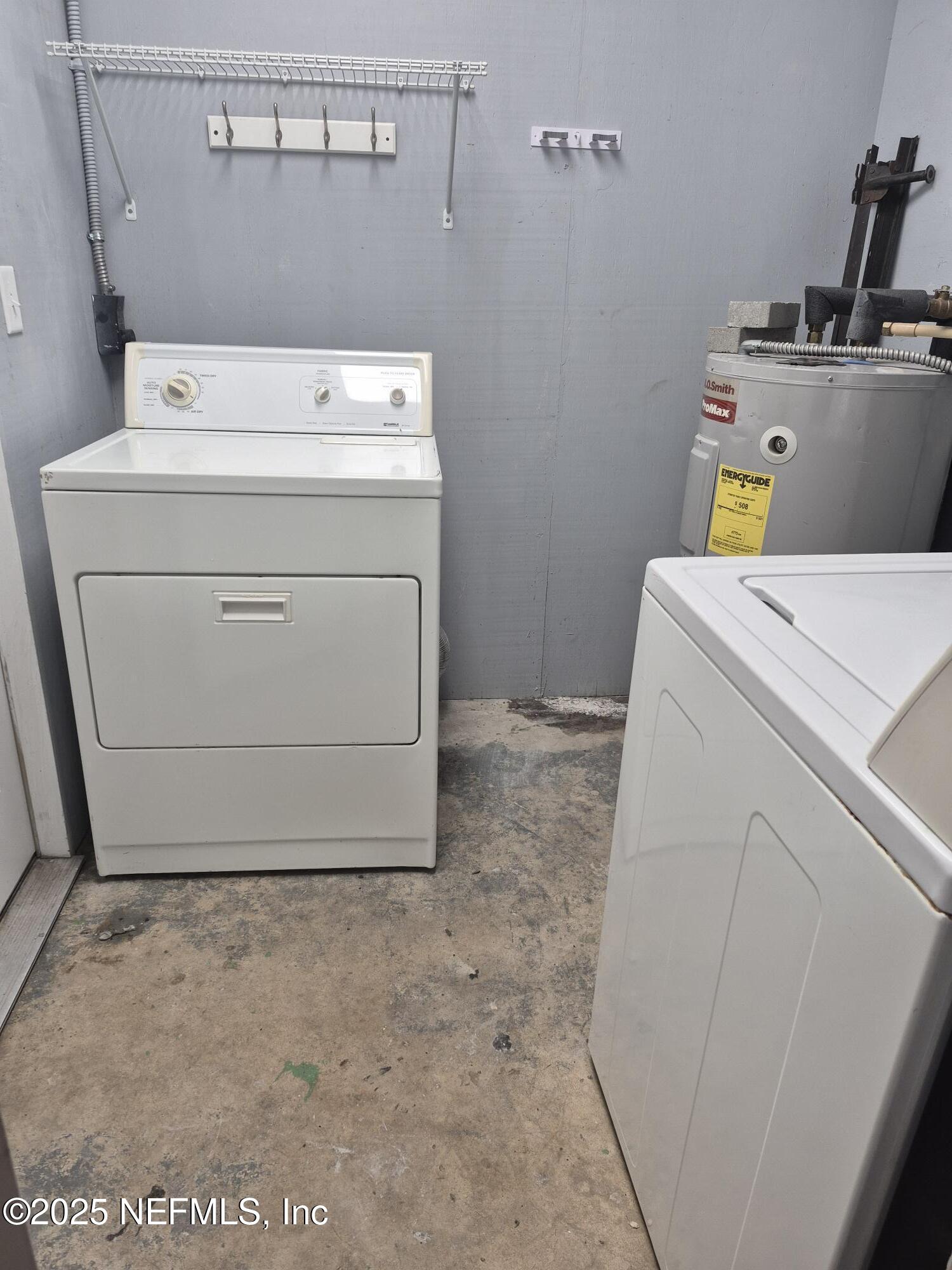 223 Edson Drive Orange Park, FL 32073 - Photo 14 of 21 a utility room with dryer and washer