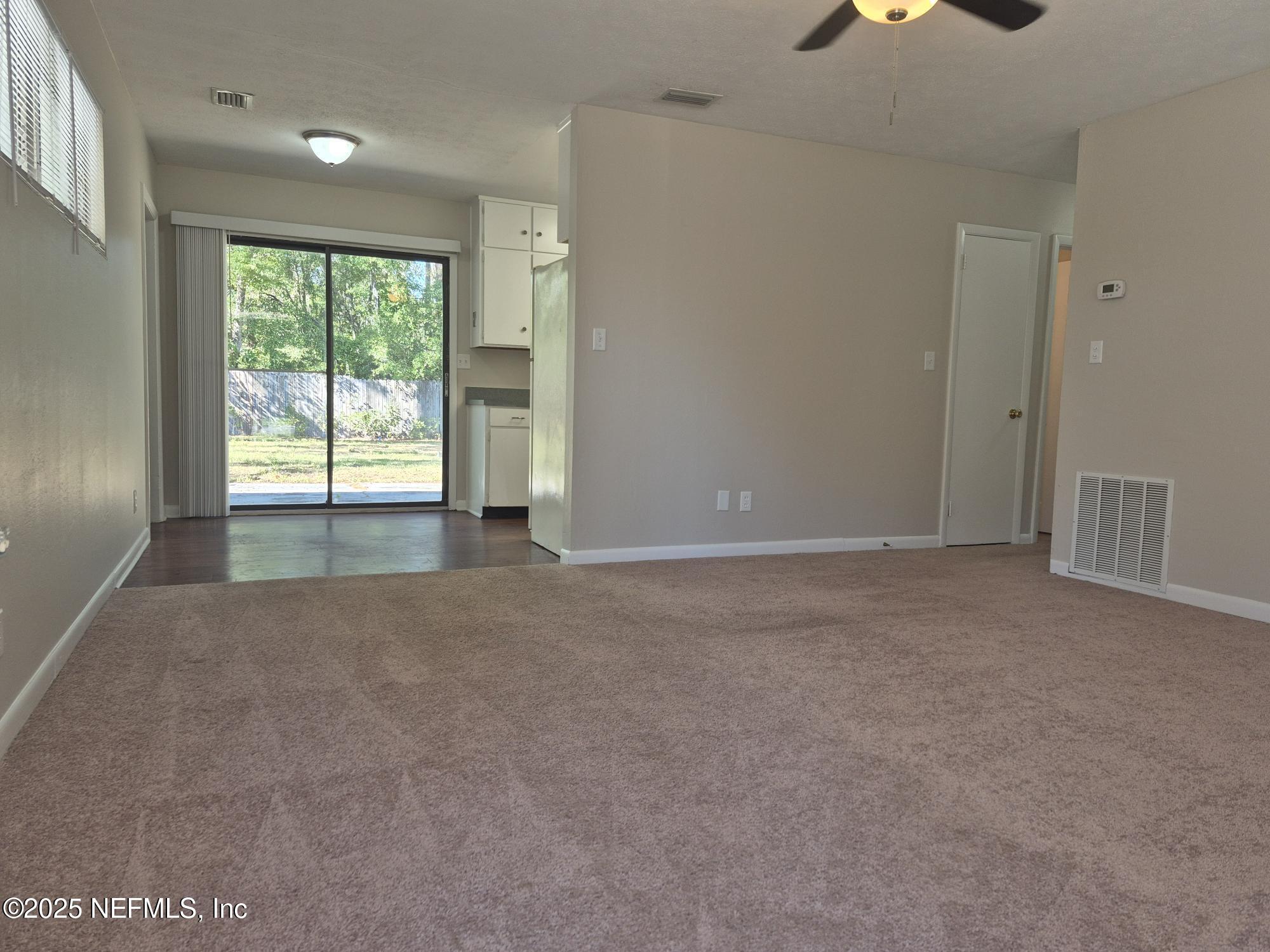 223 Edson Drive Orange Park, FL 32073 - Photo 5 of 21 a view of an empty room with a window