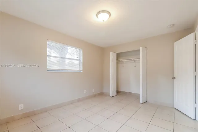a view of an empty room with window