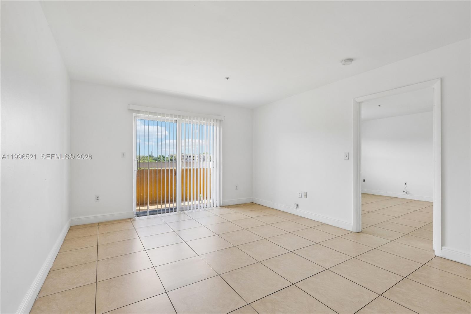 4137 Stirling Road, Unit 507 Dania Beach, FL 33314 - Photo 10 of 20 a view of an empty room with a window