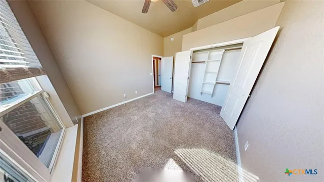 an empty room with windows