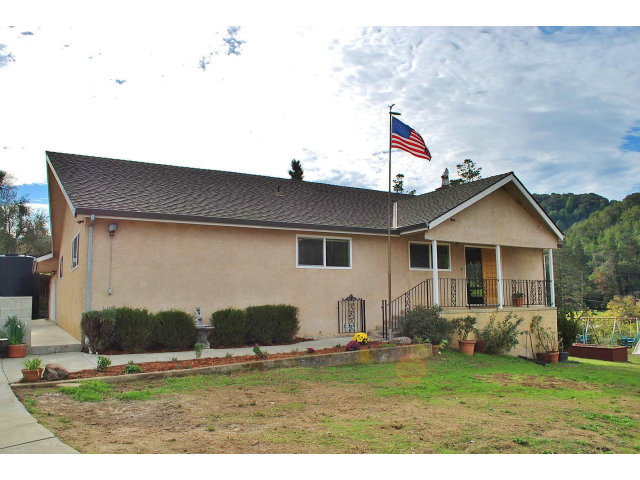 26928 Palomares Road Castro Valley, CA 94552 - Photo 2 of 10 a house view with a garden space