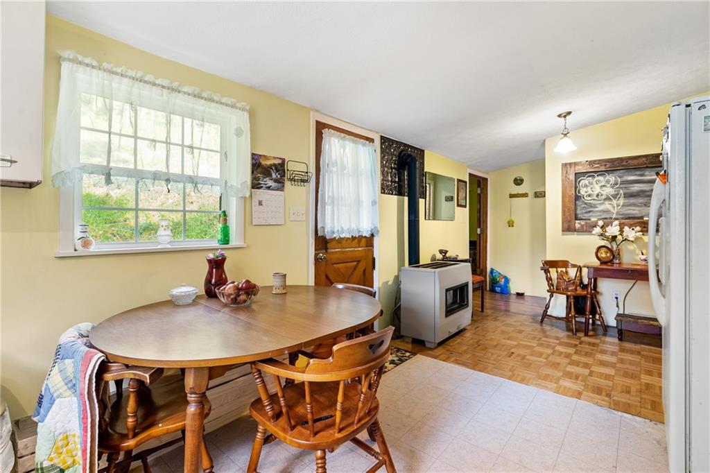 170 Paradise Road Industry, PA 15052 - Photo 9 of 24 a dining room with furniture and window