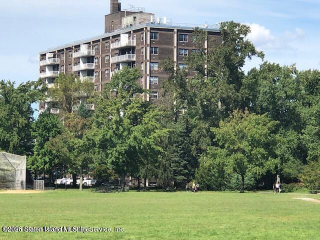1100 Clove Road, Unit 7O Staten Island, NY 10301 - Photo 2 of 36 a view of a big building with a yard