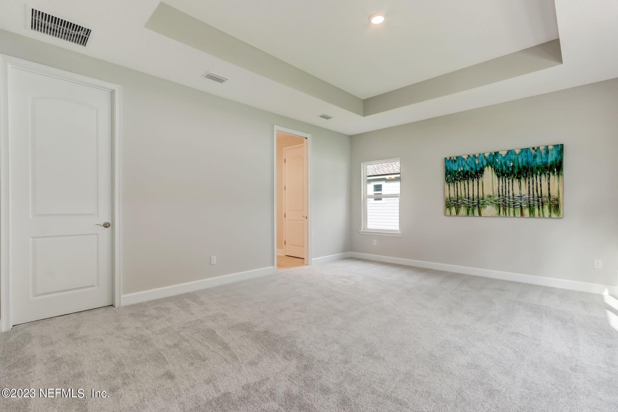 85164 Sandy Ridge Loop, Unit 19 Yulee, FL 32097 - Photo 12 of 23 an empty room with windows