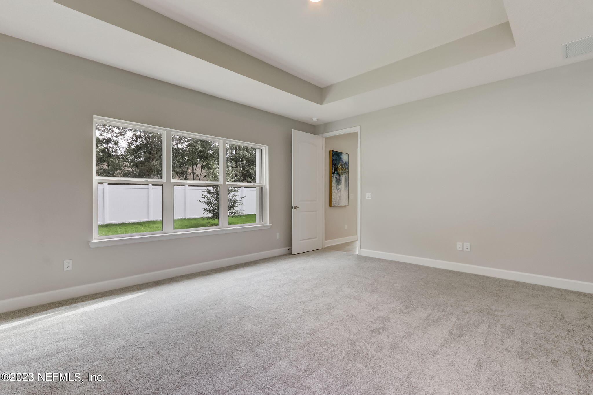 85164 Sandy Ridge Loop, Unit 19 Yulee, FL 32097 - Photo 13 of 23 an empty room with windows
