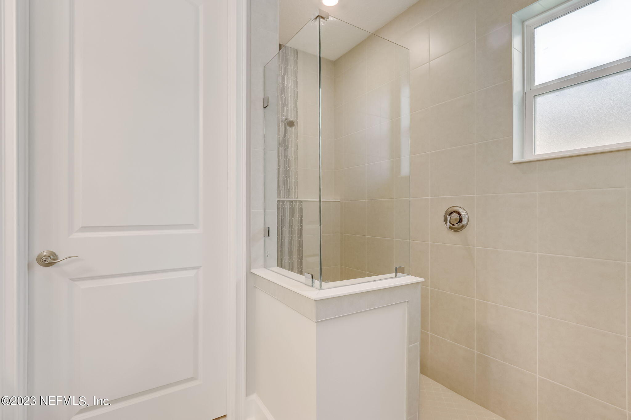 85164 Sandy Ridge Loop, Unit 19 Yulee, FL 32097 - Photo 15 of 23 a bathroom with a shower