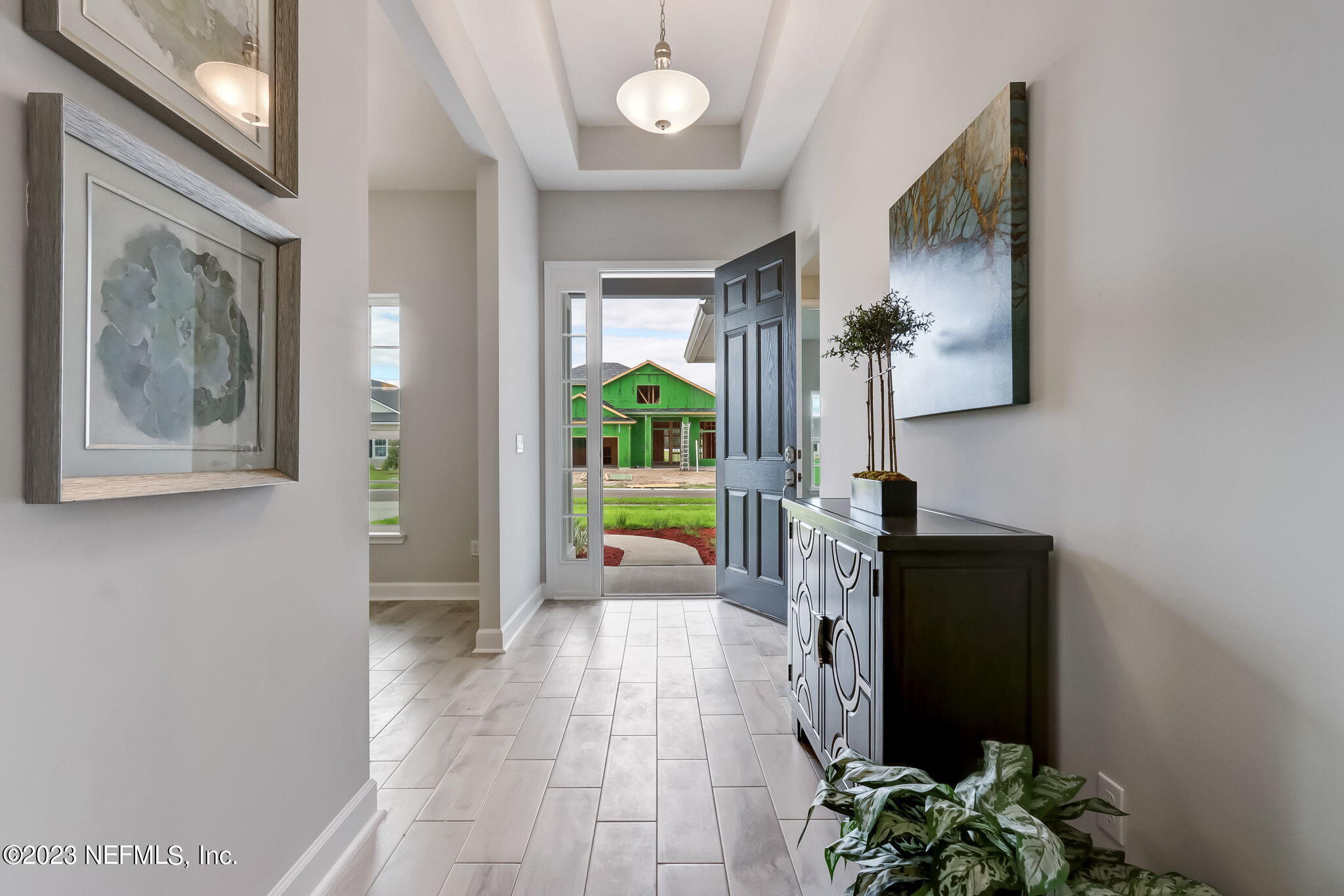 85164 Sandy Ridge Loop, Unit 19 Yulee, FL 32097 - Photo 3 of 23 a view of an entryway with wooden floor