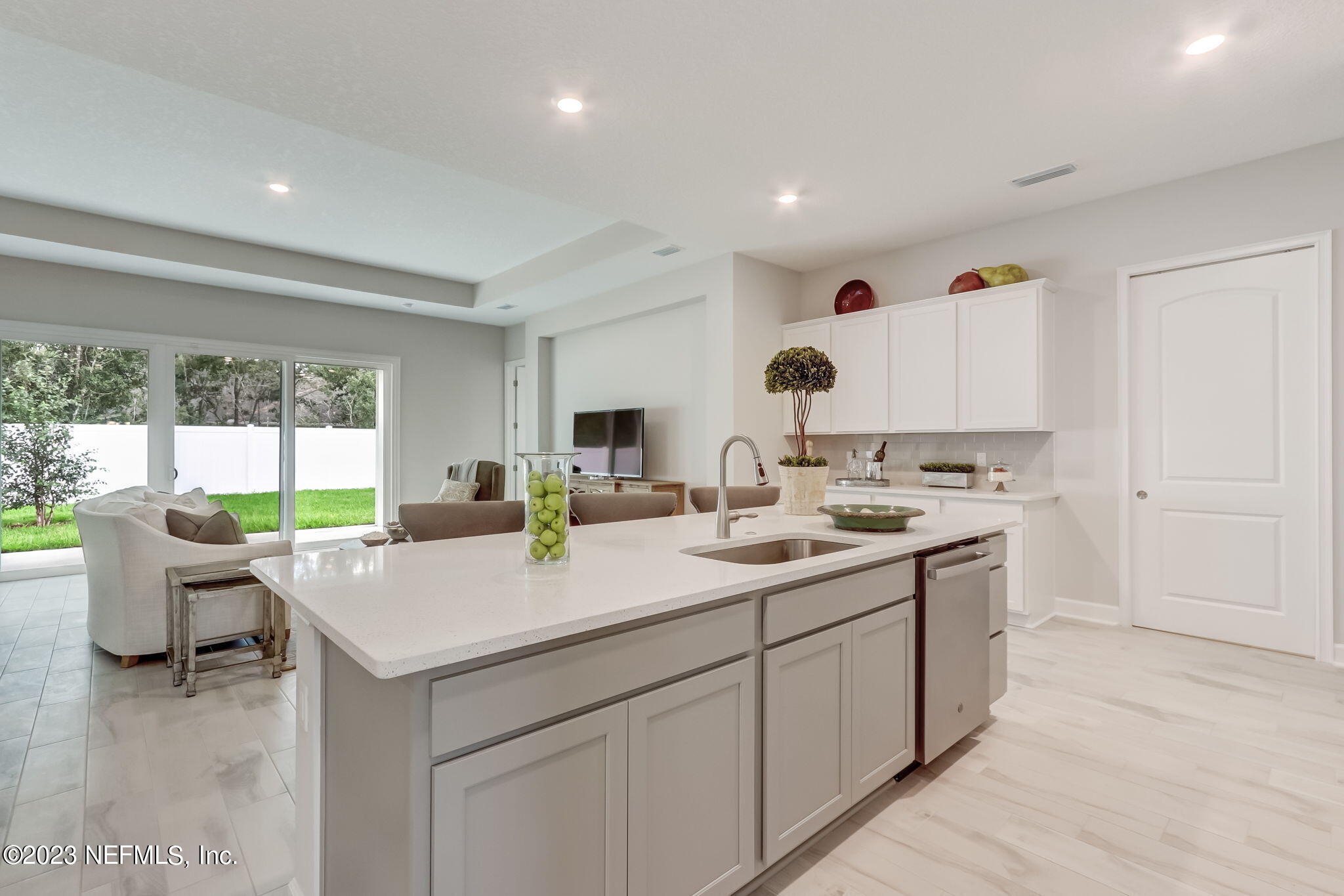 85164 Sandy Ridge Loop, Unit 19 Yulee, FL 32097 - Photo 8 of 23 a kitchen with a sink and a stove top oven