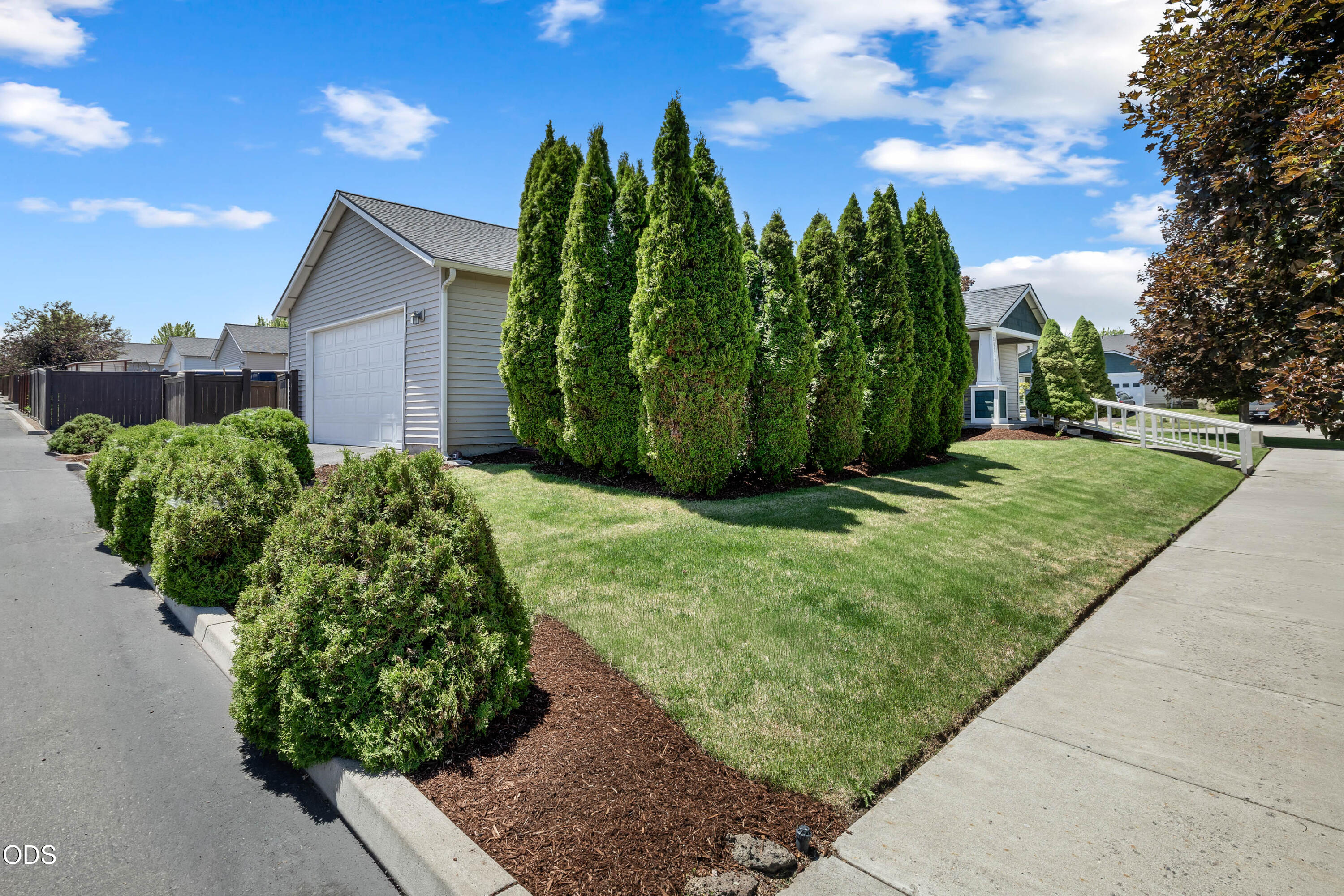 20535 Sunderland Way Bend, OR 97701 - Photo 4 of 41 a view of a garden with a pathway