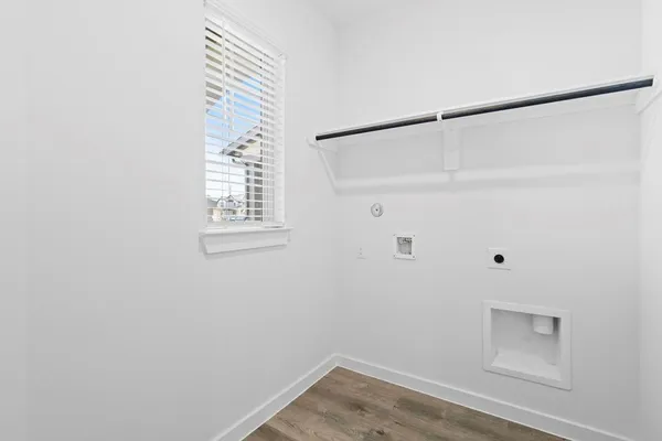 a view of a small space with racks on the wall