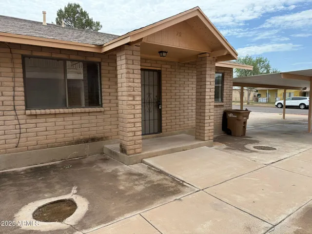 a front view of a house with entertaining space