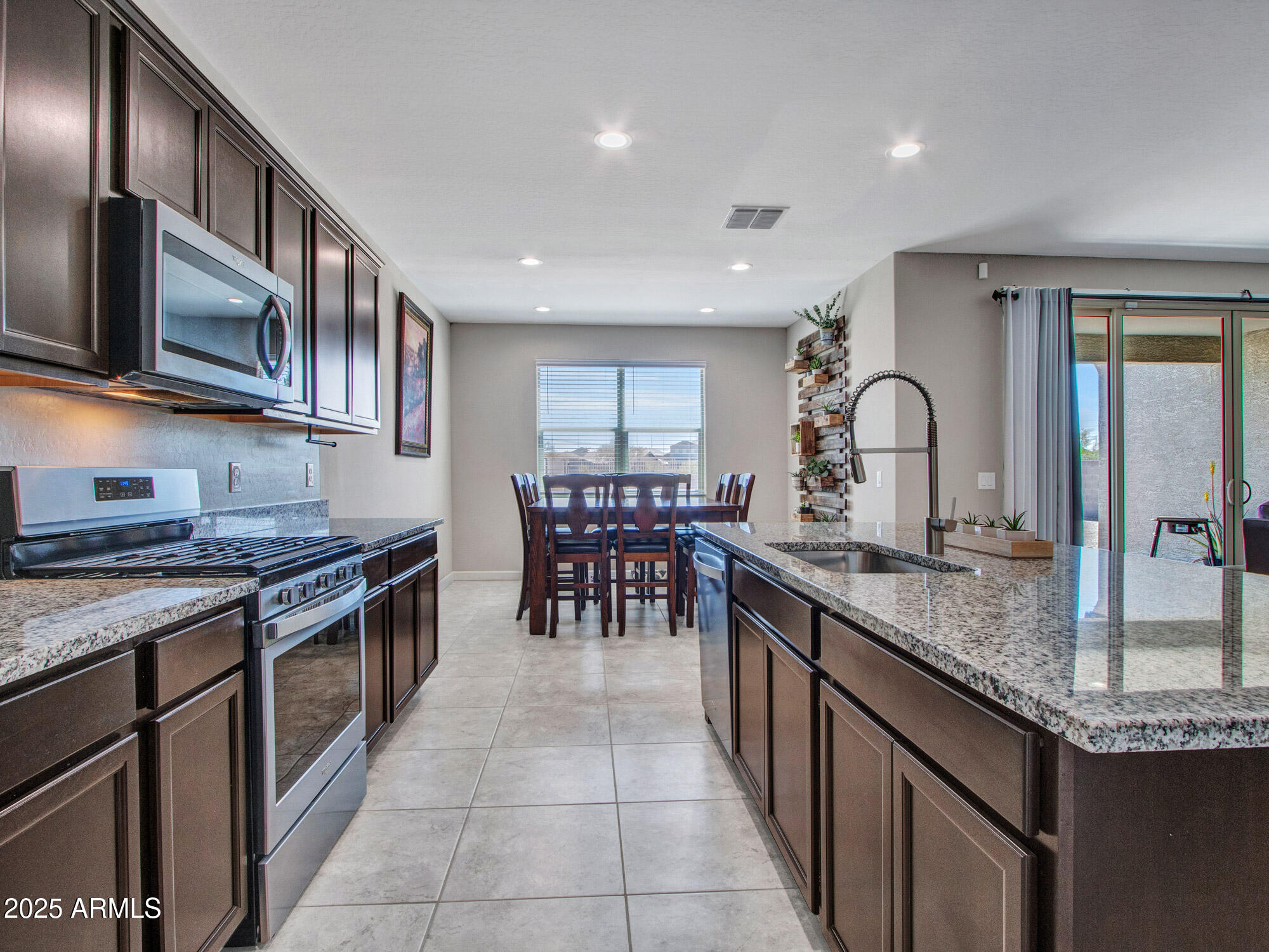 3025 North Brooklyn Drive Buckeye, AZ 85396 - Photo 13 of 34 Light filled kitchen