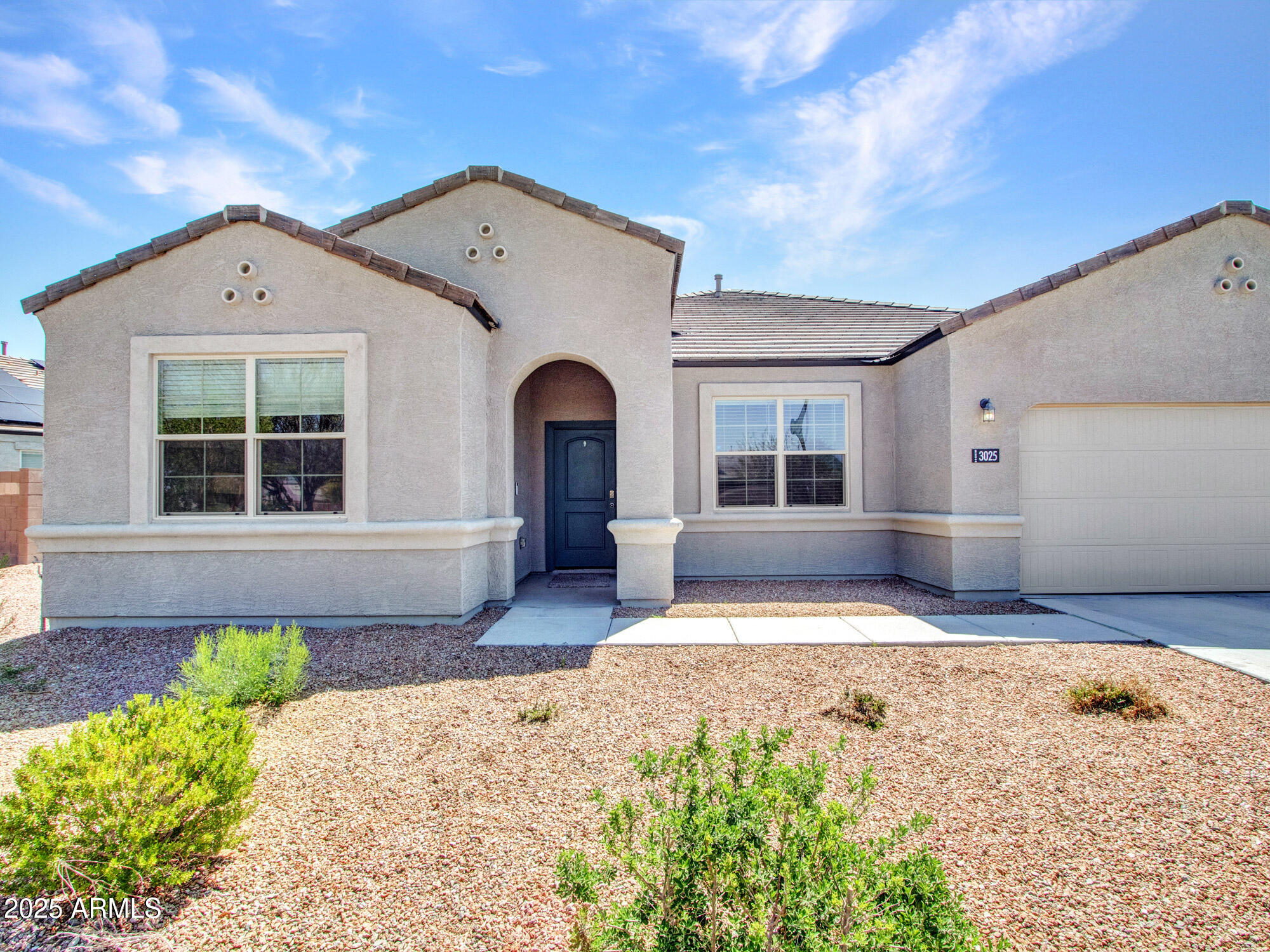 3025 North Brooklyn Drive Buckeye, AZ 85396 - Photo 7 of 34 Front patio and covered entrance